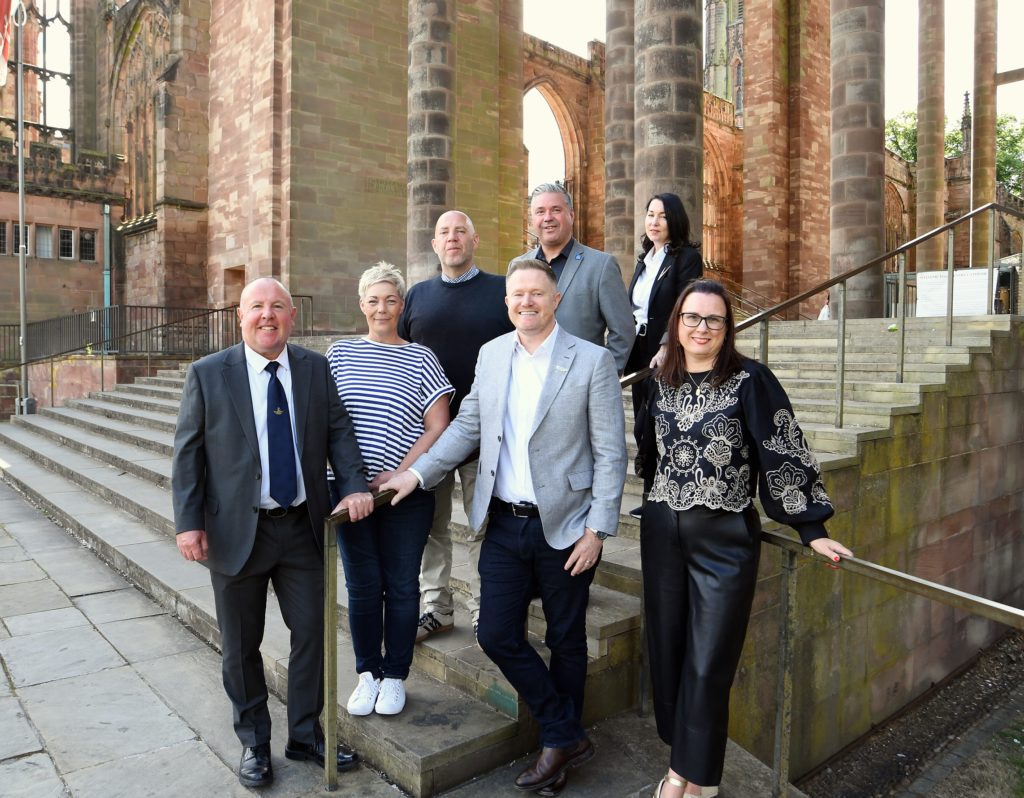 Group standing outside Coventry Cathedral